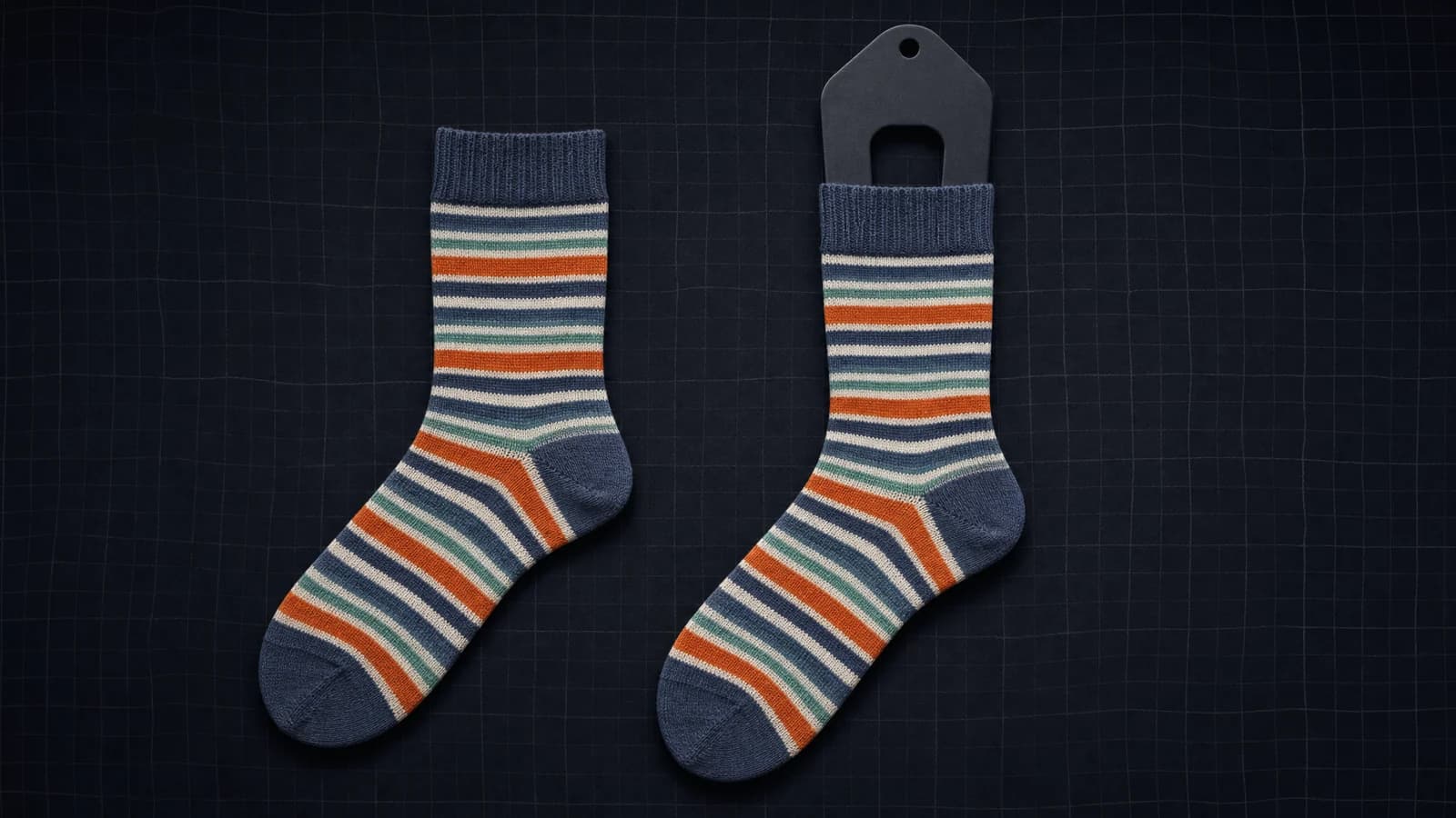 Flat beside form on a sock form. The same sock, twice. The difference is the whole product. Modelled stretch, not a photograph of a worn sock.